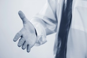 Image of stretched human hand ready for a handshake
